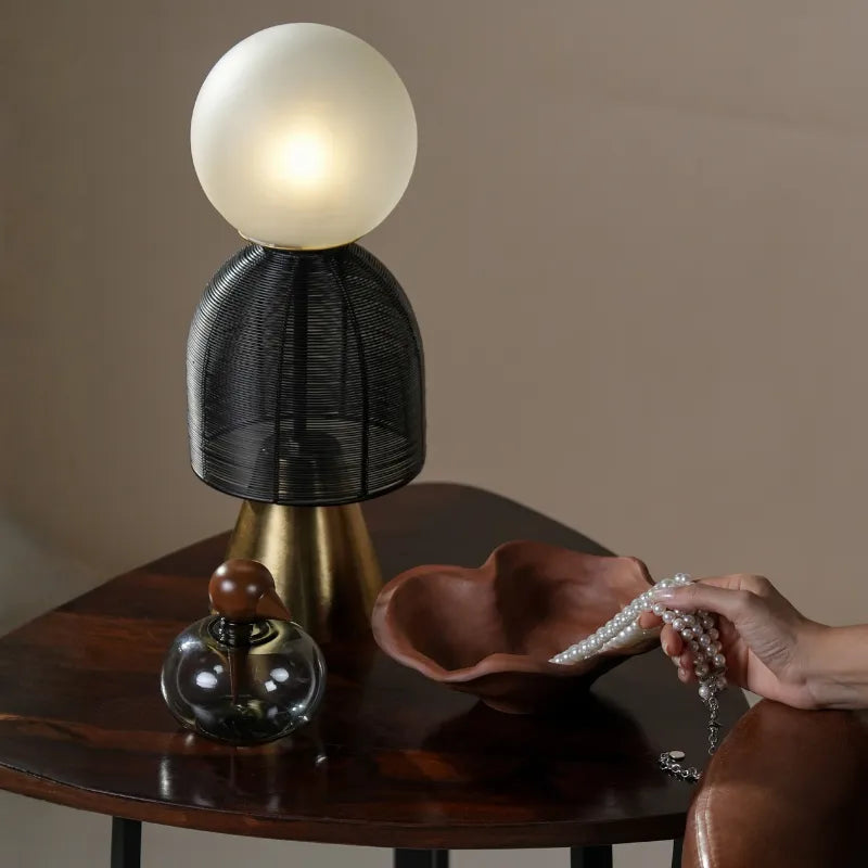 Chirp Glass Jar & Kai Bowl gift set, perfect for gifting placed next to a glowing table lamp