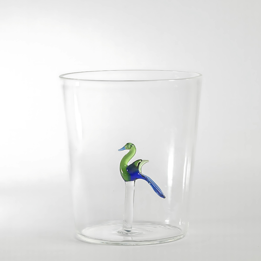 Jade Drinking Glass, clear glass tumbler with a colorful peacock design on a white background