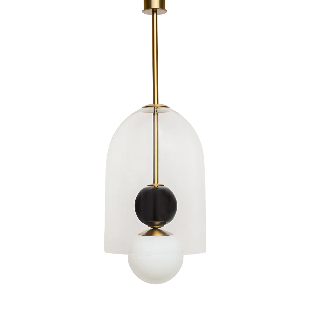 A pendant light fixture with a white glass globe and a metallic frame, hanging from the ceiling.