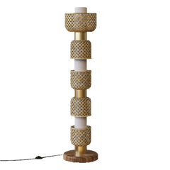A floor lamp with a bamboo shade, brass finish on the center column, and a wood base.