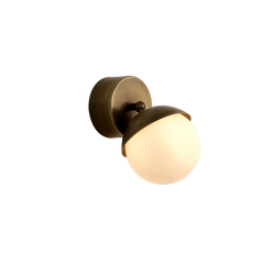 Fly Wall Sconce Small – brushed brass finish with minimalist round back-plate and frosted glass globe.