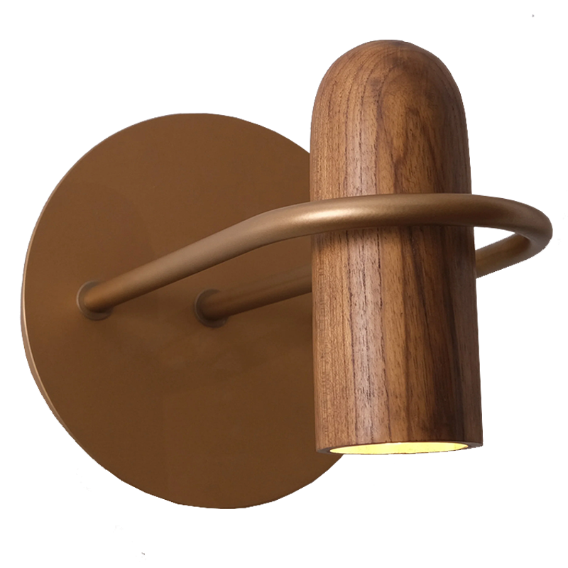 A wall-mounted light fixture with a wood body and matte gold metal wall rose.