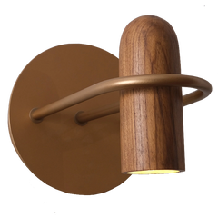 A wall-mounted light fixture with a wood body and matte gold metal wall rose.