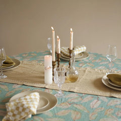 Mirage Sand Linen Table Runner on dining table with brass candlesticks and place settings