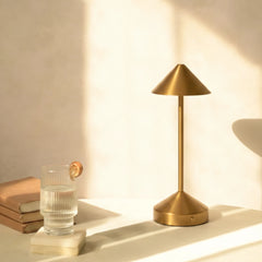 Brass Orbit Portable Lamp with soft lighting