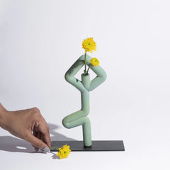 Vrikhasana - tree pose Sculptural vase on a white background