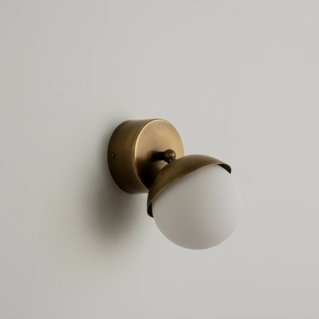 Brass Fly Wall Sconce Small with a white glass shade on a light gray background