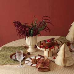 Rhubarb Velvet Napkin Rings on dining table with cake stand and paper tree, front view