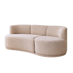 Velune 3 Seater Swivel Sofa angled view of curved off-white boucle seat modules without cushions