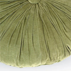 A close-up of a round, olive green cushion with a pleated, sunburst design radiating from the top center, set against a plain white background.
