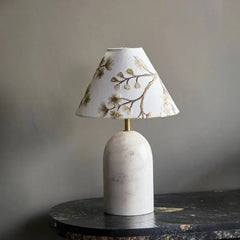 Luna Table Lamp - Styled on Dark Marble Side Table Against Grey Wall