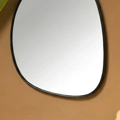 Pebble Mirror with soft curved minimal metal frame for entryway or bedroom wall
