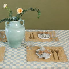 Sand Velvet Napkin Rings on place settings with sage ceramic vase and checked tablecloth