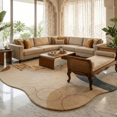 Modern living room with beige sectional sofa, wooden armchair, and decorative items.