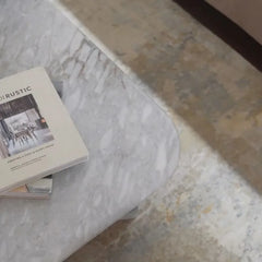 ORML Coffee Table - Top-Down Corner Detail with Book, Grey Marble Surface
