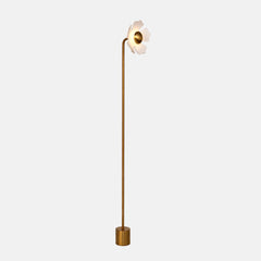 Modern floor lamp with a unique flower-shaped ceramic shade and brushed gold stem