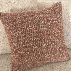 Velune 3 Seater Swivel Sofa close-up of rust textured cushion against off-white boucle upholstery