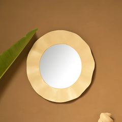 Ripple Mirror with gold circular gold scalloped iron frame and round mirror in between
