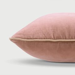 Pink pillow on a light gray background