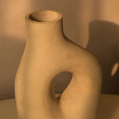 Table decor Beige ceramic Savanna Vase with abstract design against a warm-toned background