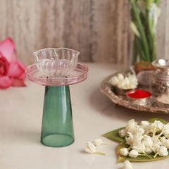 Pushp Glass Diya – empty fluted clear glass diya bowl on blush flower plate with teal borosilicate glass stand