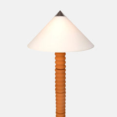 Close look of Tall floor lamp with terracotta base and white lampshade