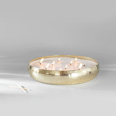 Jali Tray Candle - Gold - Oud Rose, lit gold metal tray candle with multiple wicks, front view