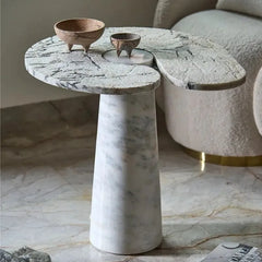 Orbit Side Table - Tapered White Marble Pedestal Beside Boucle Chair
