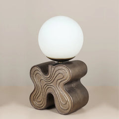 Unique Eton Table Lamp, made of aluminum base, finished in antique brass with smooth glass globe on top