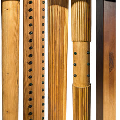Colonnade Dining Table close-up of pillar legs in reeded, studded and plain white ash finishes