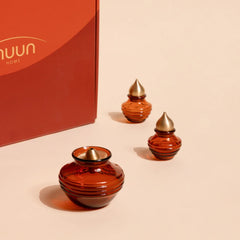 Composite Gift Box, kalash oil lamp and two mini kalash with brass caps beside orange box