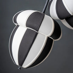 Close-up of a black and white striped Acorns Pendant Lamp 