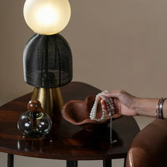 Chirp Glass Jar & Kai Bowl gift set, perfect for gifting placed next to a glowing table lamp