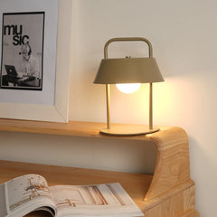 Unique Porto Table Lamp on a wooden surface with an open book
