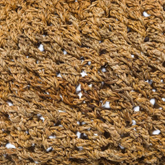 Close-up of a textured brown fabric surface used in the Clay Pendant Light