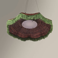 Woven pendant lampshade with grass-like texture on a plain background