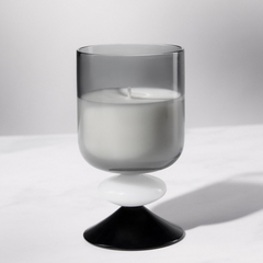 Decorative black Glass candle on a white background