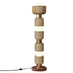 Decorative Metamorphosis Floor Lamp with bamboo woven design  showing warm ambient glow