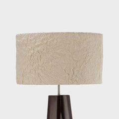Close-up detail of Textured beige banana-fibre paper lampshade