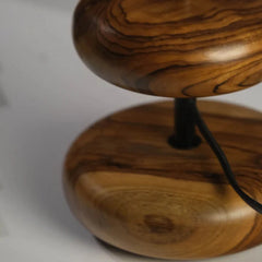 Wooden Bedside Lamp, close view of earthy wood textured base