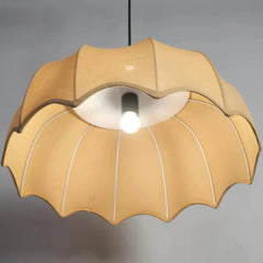 Beige pendant light with a scalloped edge for classic aesthetic look
