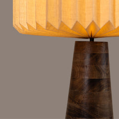 Close view of Wooden table lamp with a textured shade and wooden base