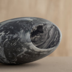 Marble-patterned decorative Bella Black Vase on a beige background