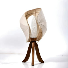 Decorative unique Kosh Table Lamp with a wooden base and beige fabric shade on a white background