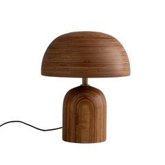 Decorative small wooden table lamp with a dome-shaped shade on a white background