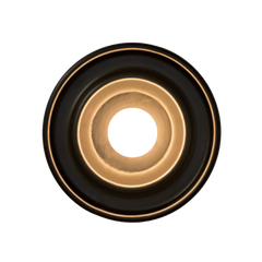 Discus Wall Light Black mounted on wall in modern living-room setting casting ambient light