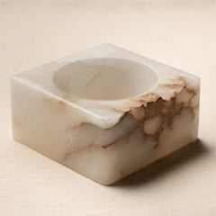 Tunnel Wall Sconce: hand-carved alabaster square with central tunnel form that softly diffuses light