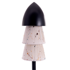 The Lit Guardian Floor Lamp close-up detail of its sculptural ash-wood character design
