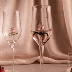 Close look of With Love -Champagne Flutes Glasses having a rose and green leaves design