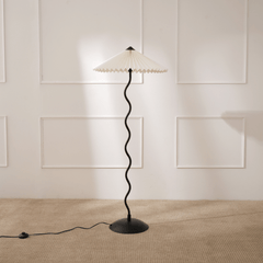 Wavy Floor Lamp sowing hand-pleated paper shade texture and black metal rod and stand
